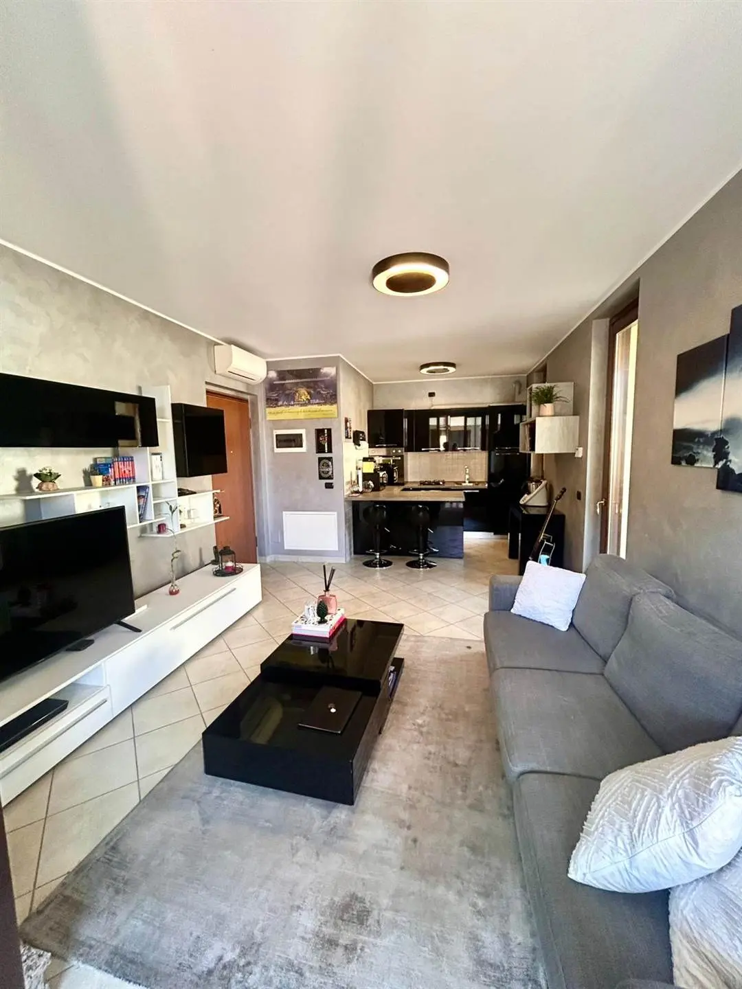 Elegante Bilocale con Terrazzi e Finiture Moderne – Cavenago di Brianza