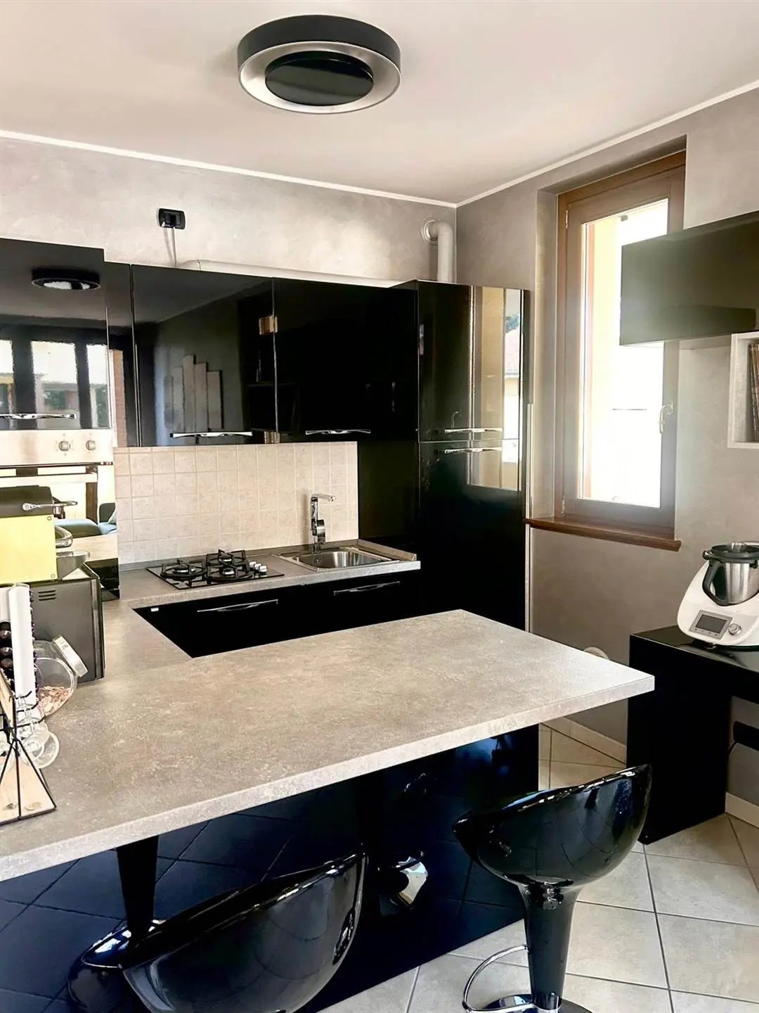 Elegante Bilocale con Terrazzi e Finiture Moderne – Cavenago di Brianza